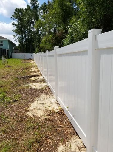 white vinyl fence installation